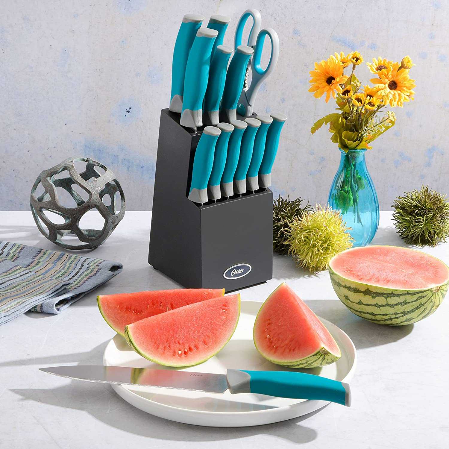 Oster Conjunto de talheres de aço inoxidável Lindbergh com 14 peças, bloco preto, alças azul-petróleo, azul-petróleo/preto