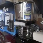 Cafeteira Oster Inox, 1,2L, 110V, Preto/Inox, 750W na Amazon