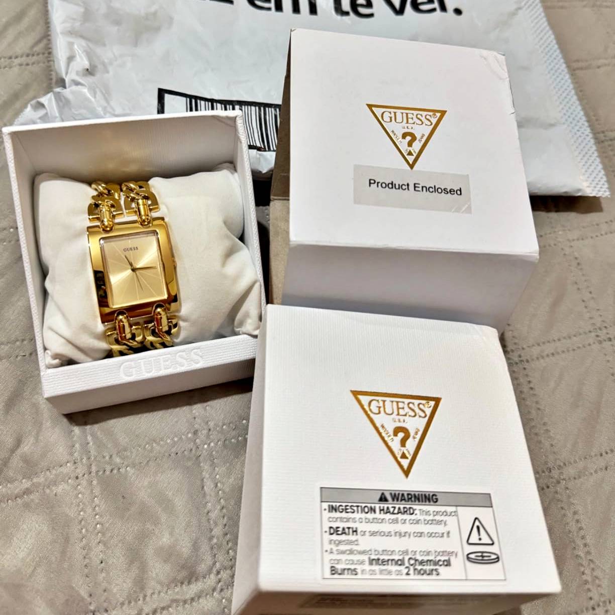 GUESS Relógio feminino com várias correntes prateadas com elos autoajustáveis. Cor: prateado (modelo: U1117L1) na Amazon